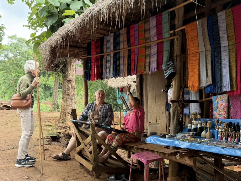 Homerly residents visiting a hill-tribe textile and craft community in Chiang Rai